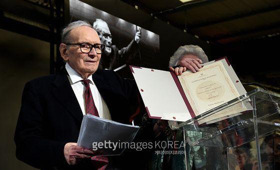 MILAN, ITALY - FEBRUARY 27: Ennio Morricone receives the Honorary Degree at Accademia di Belle Arti di Brera on February 27, 2019 in Milan, Italy. (Photo by Pier Marco Tacca/Getty Images