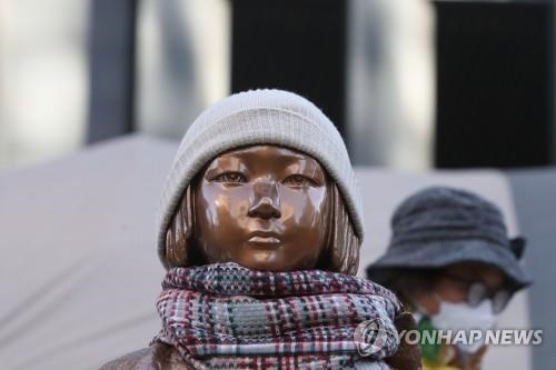 위안부 피해자들, 일본 정부에 승소…법원 "1억원씩 지급"