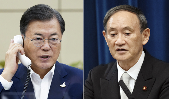 문재인 대통령이 지난해 9월 스가 일본 총리와 전화 회담을 하고 있다.
