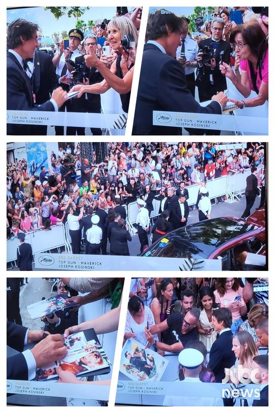 배우 톰 크루즈가 18일(현지시간) 오후 프랑스 칸 팔레 데 페스티발(Palais des Festival)에서 열린 제75회 칸영화제(Cannes Film Festival) '탑건: 매버릭' 공식 상영 일정에 참석, 레드카펫 입성 전 팬들에게 친절한 팬서비스를 보이고 있다. 〈사진=JTBC엔터뉴스〉